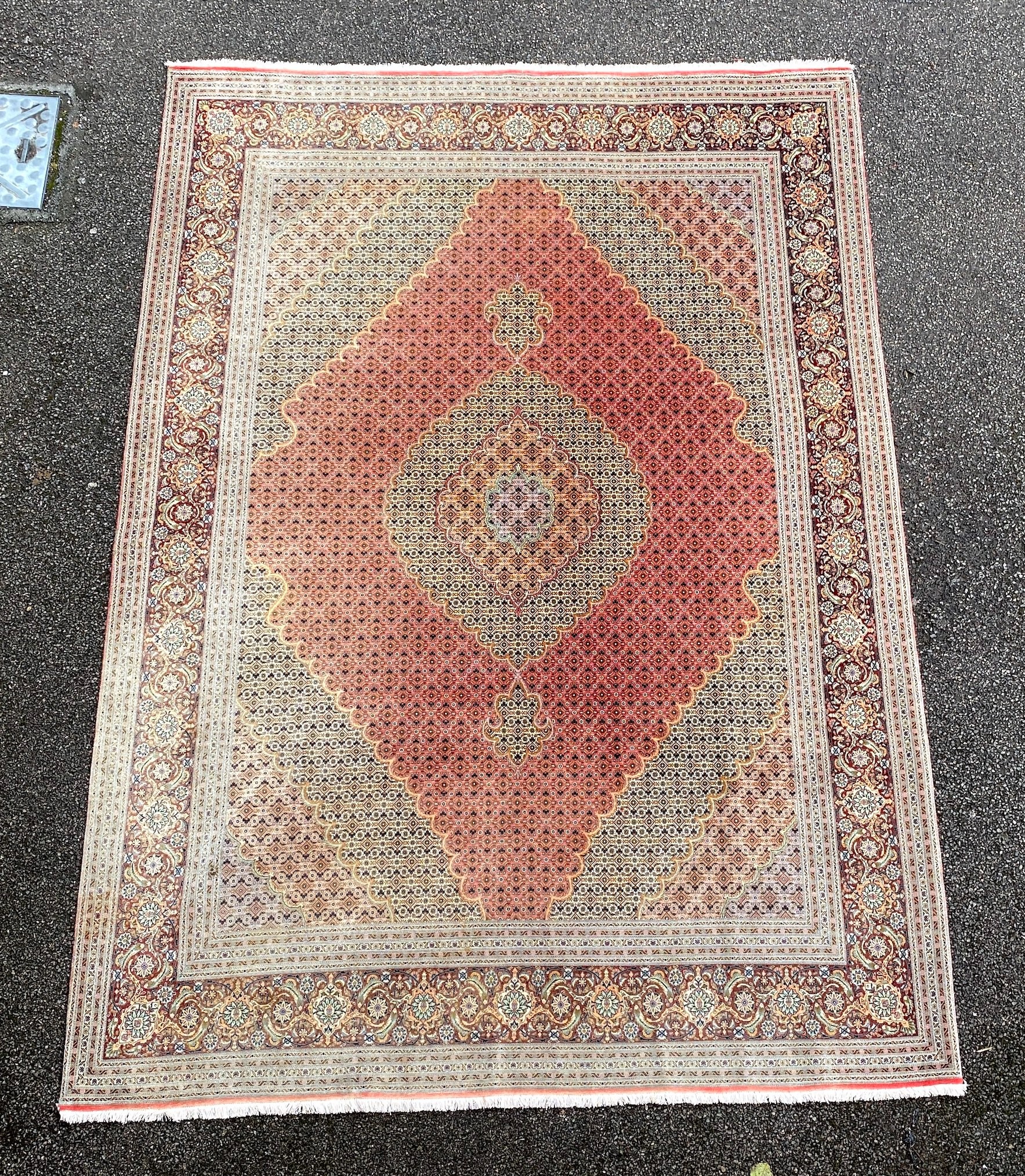 A Persian part silk Tabriz carpet, 350 x 248cm